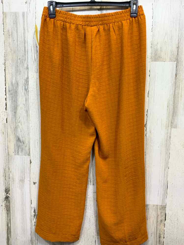PRE-OWNED Size L SOHO BOTTOMS Mustard Solid FLOWY Pants