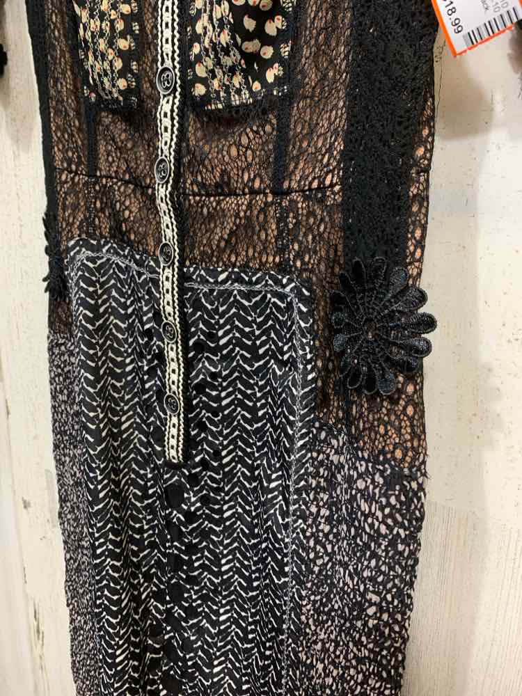 PRE-OWNED BEGUILE Dresses and Skirts Size 0 Black ABSTRACT SHORT SLEEVES Dress