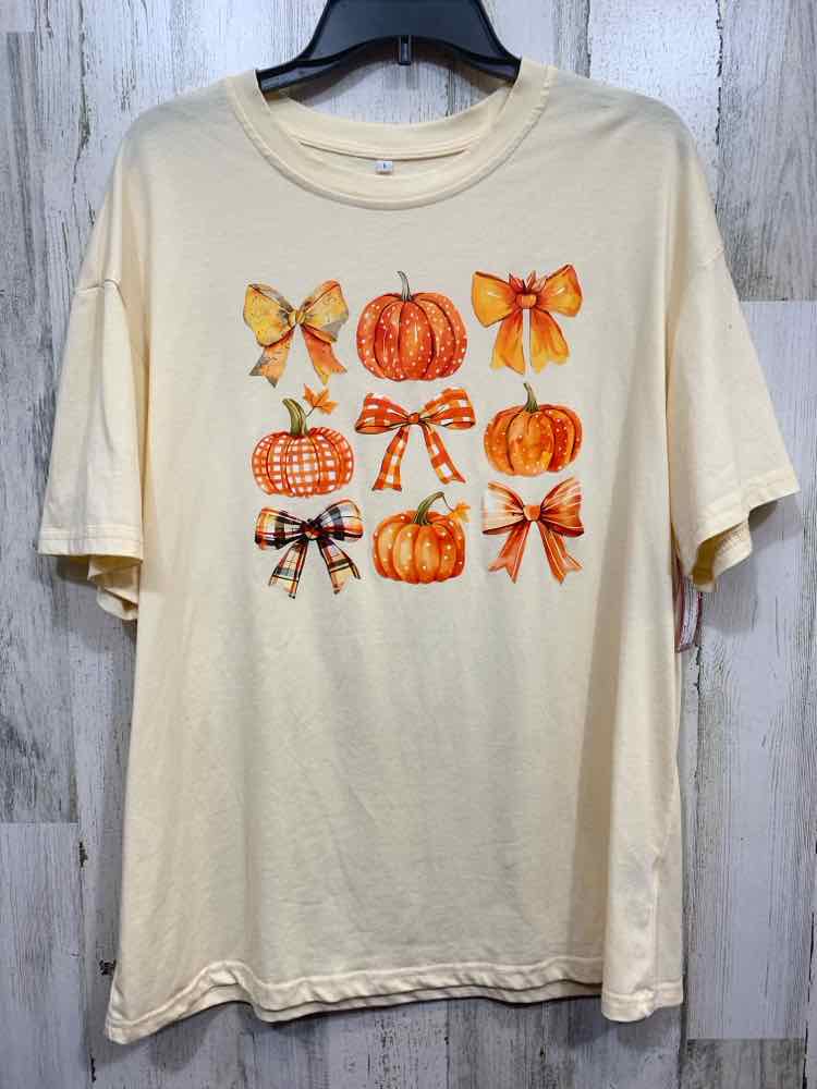 PRE-OWNED Size L Tops CREAM SHIRT W/ PUMPKIN/BOW DECALS
