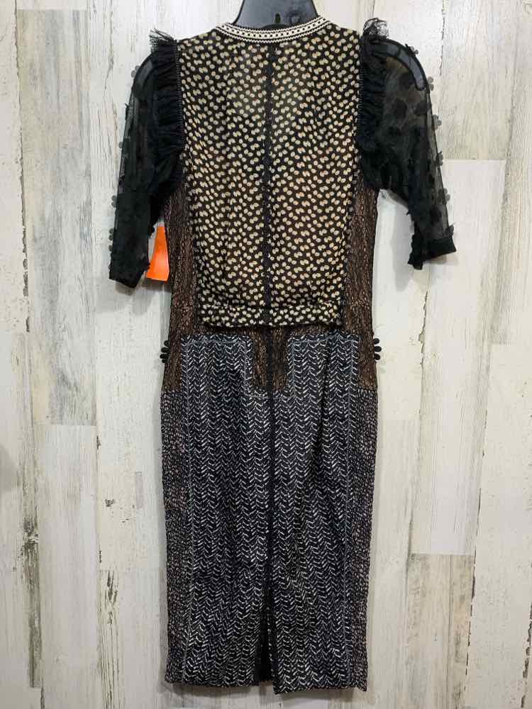 PRE-OWNED BEGUILE Dresses and Skirts Size 0 Black ABSTRACT SHORT SLEEVES Dress